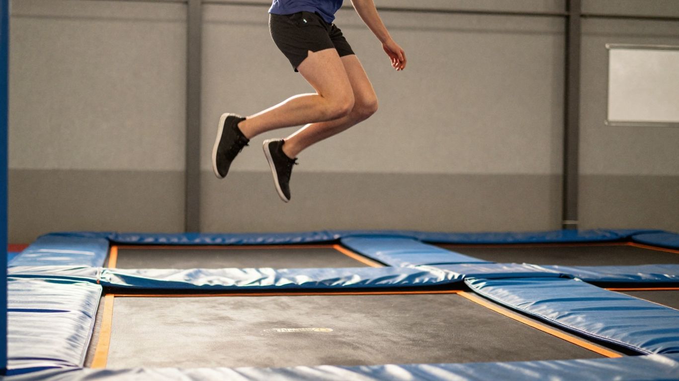 Person bouncing on a trampoline for lymphatic health.