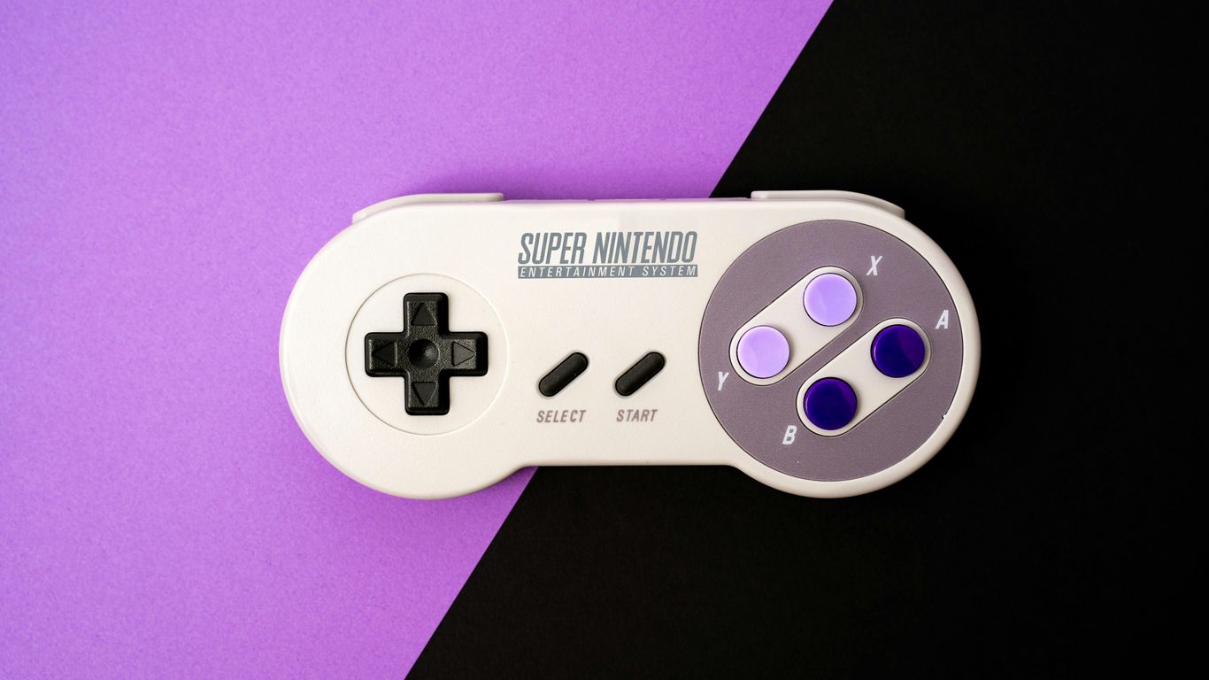 white and black game controller