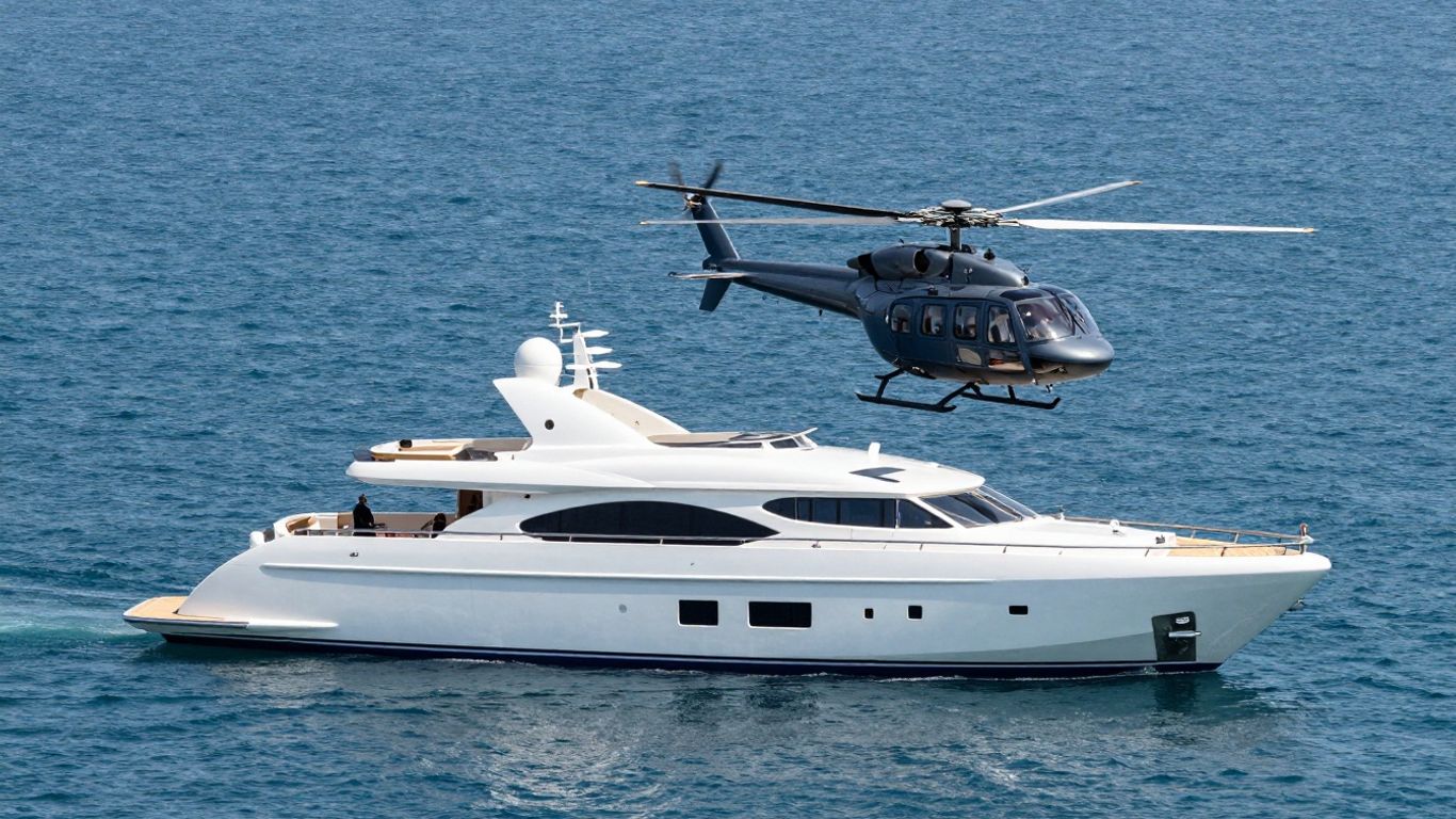 Helicopter landing on a superyacht helipad at sea.