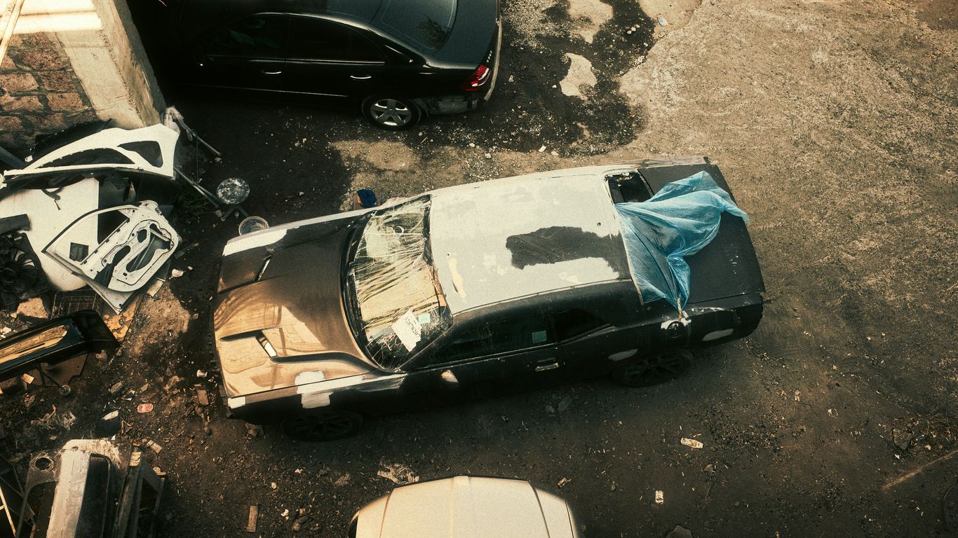 a car that is sitting in the dirt