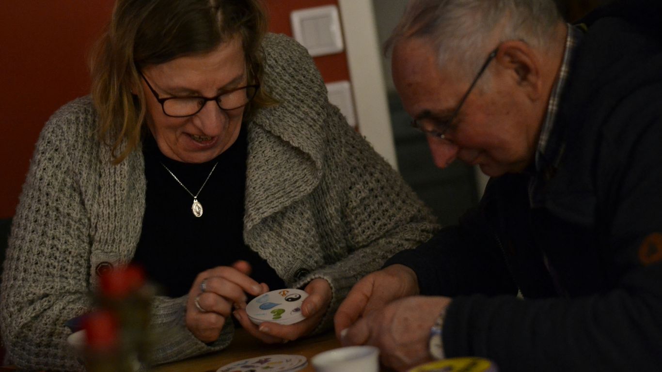 A man and a woman sitting at a table