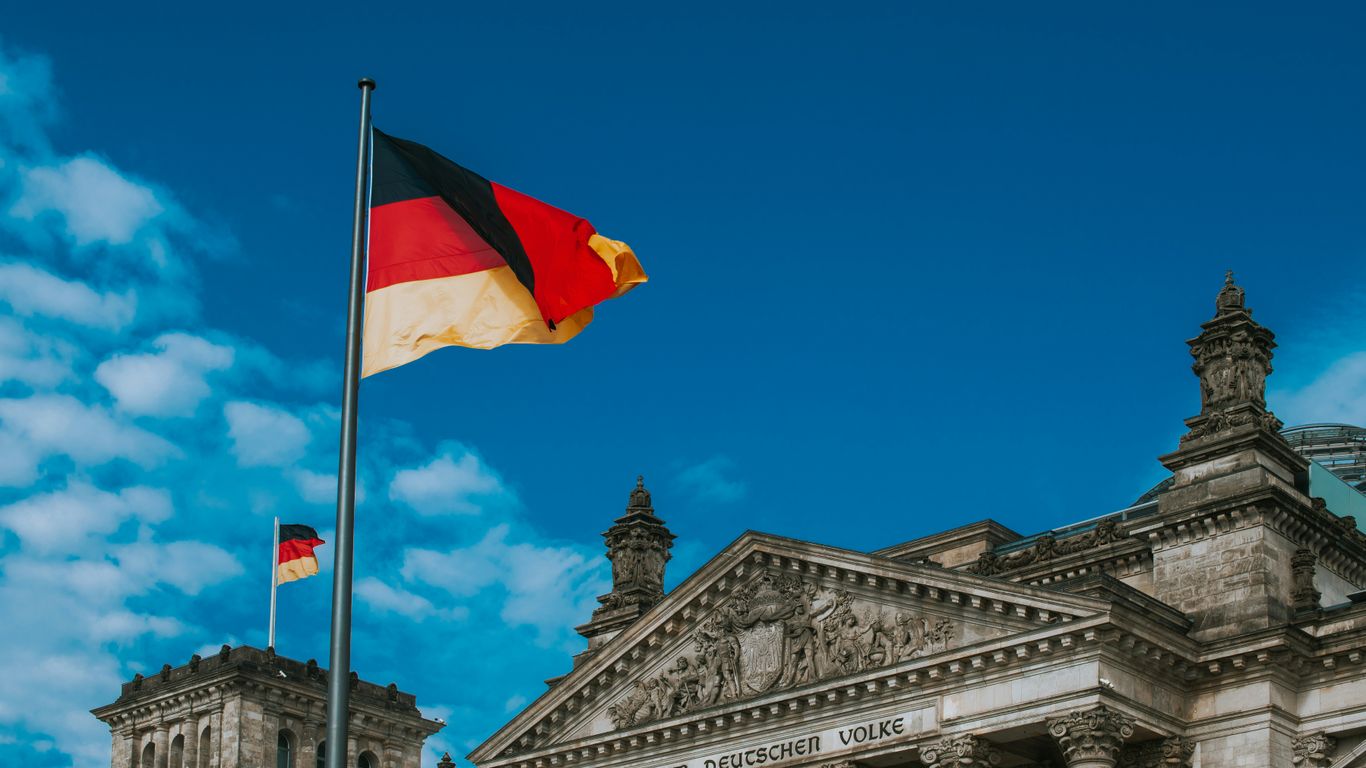 white red and yellow flag on pole