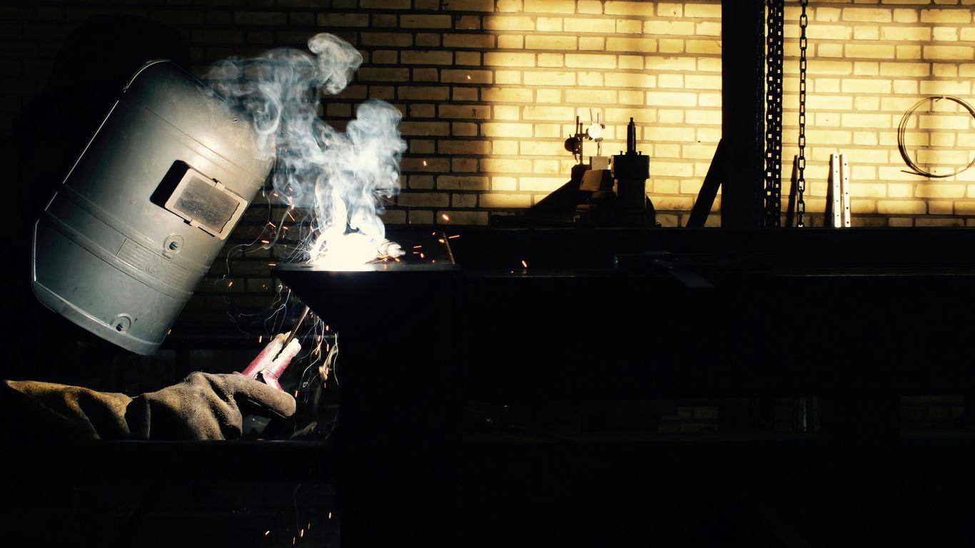 person doing welding