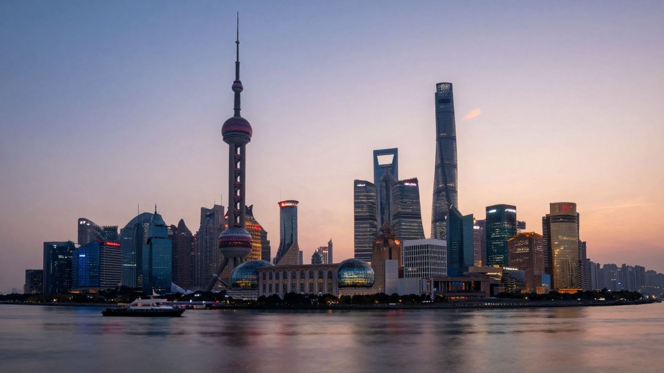 Shanghai skyline at dusk with financial district buildings.