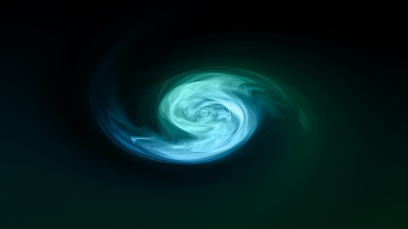 a green and blue swirl in the dark