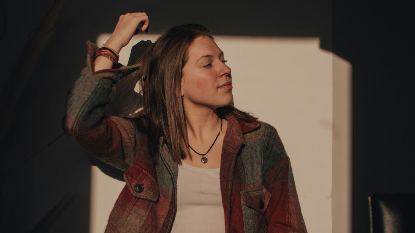 woman in brown button up jacket