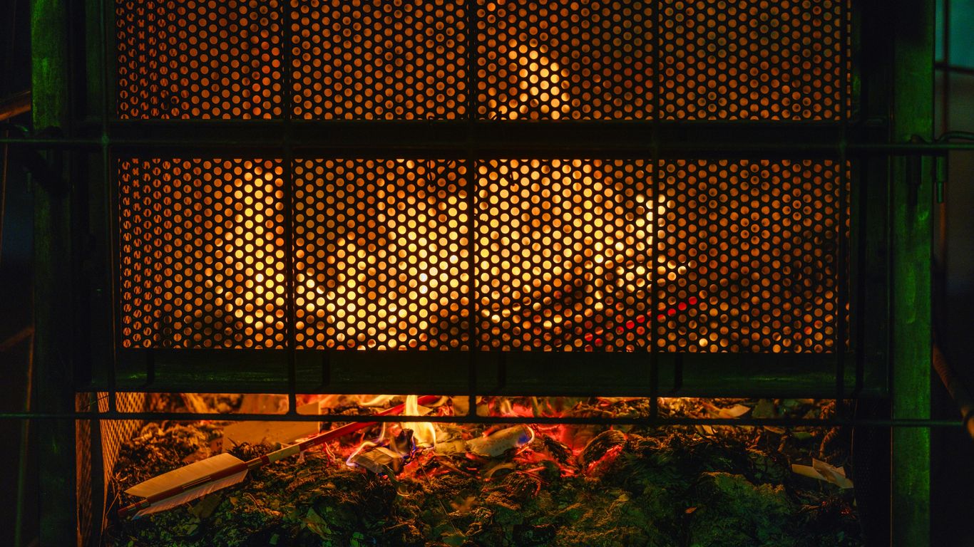 A pile of food sitting inside of a metal container