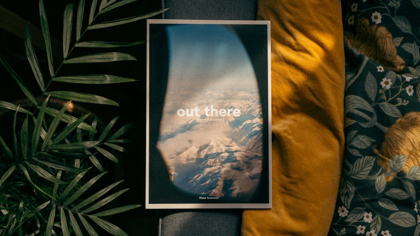 a picture of a picture of a mountain with the words out there on it