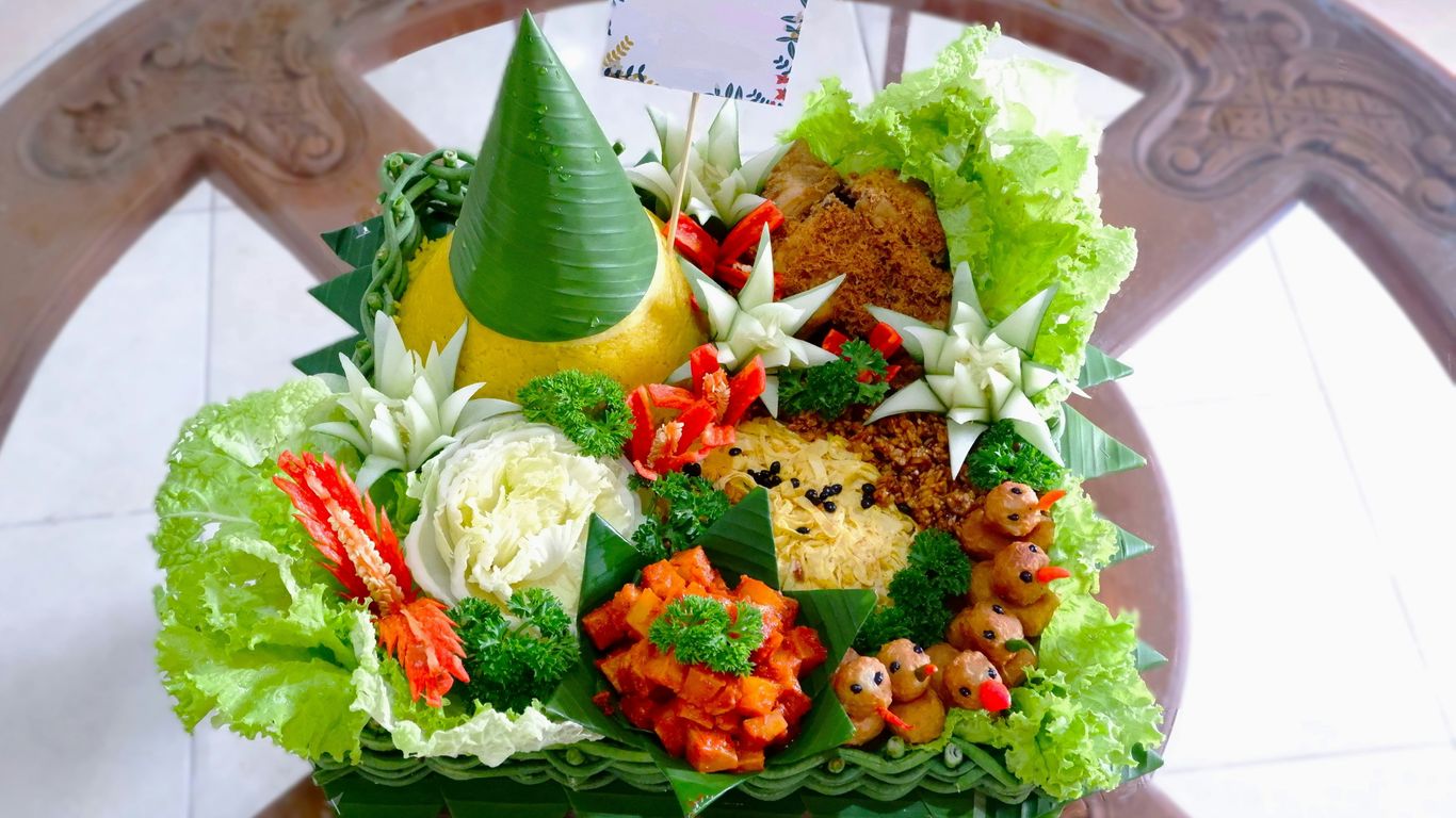 a bunch of different types of food on a table