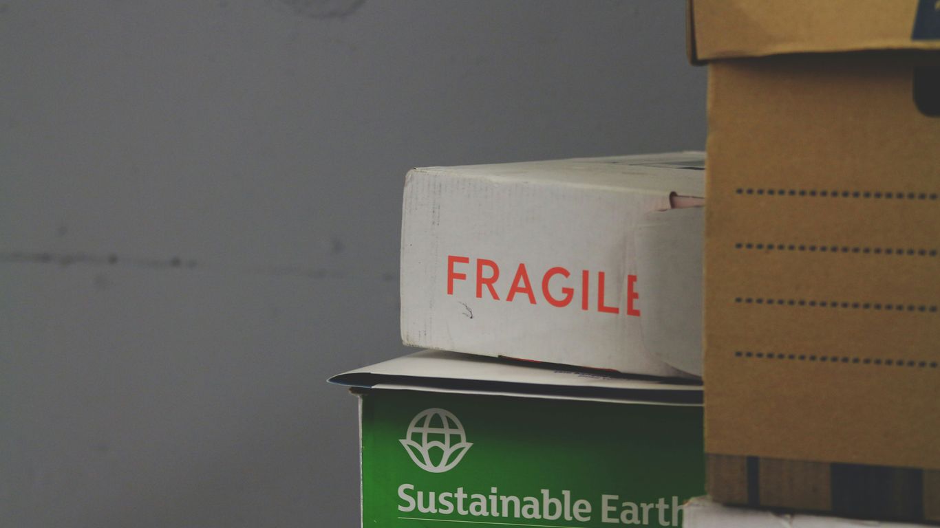 white and red Fragile labeled box