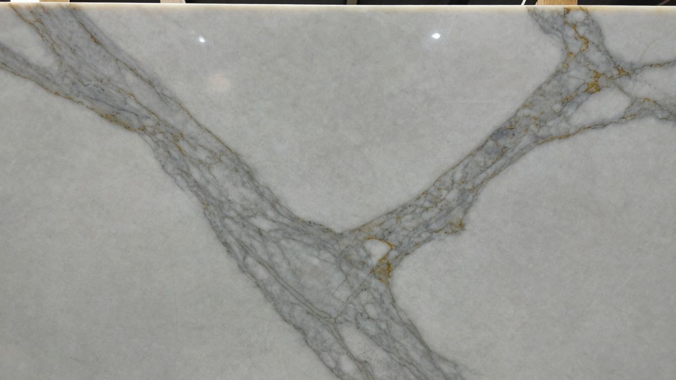 Polished Dolomite white marble slab with grey veins.