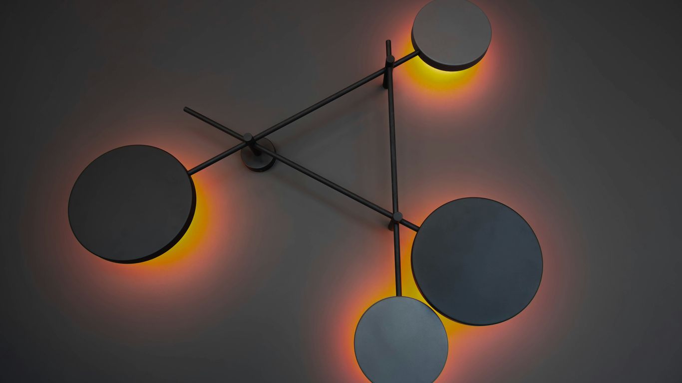 a clock with three circular lights on it