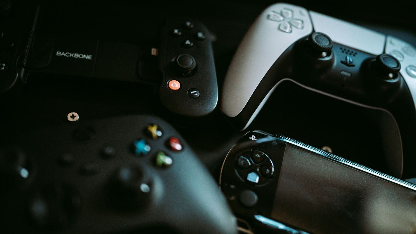 a group of video game controllers sitting next to each other