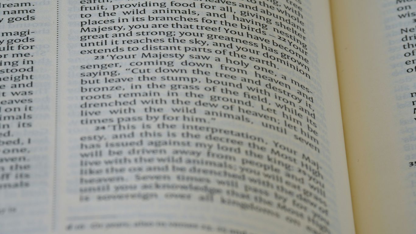 a close up of an open book with words on it