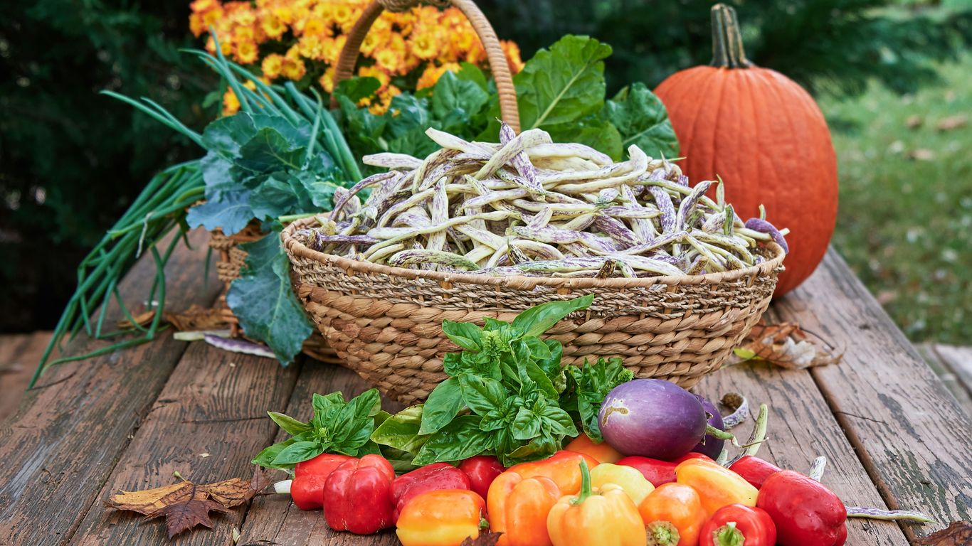 basket of fruit on wooden table