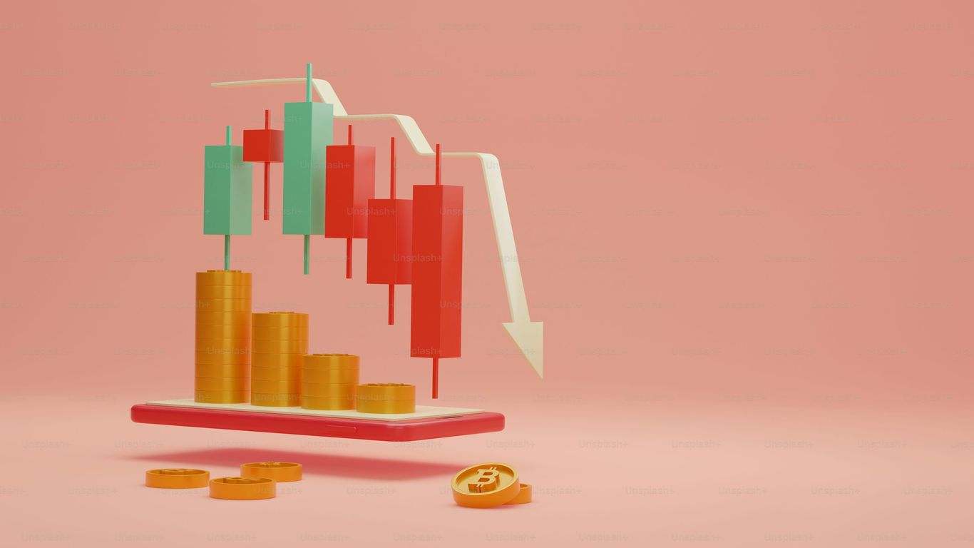 Colorful financial graph with downward trend and Bitcoin coins.