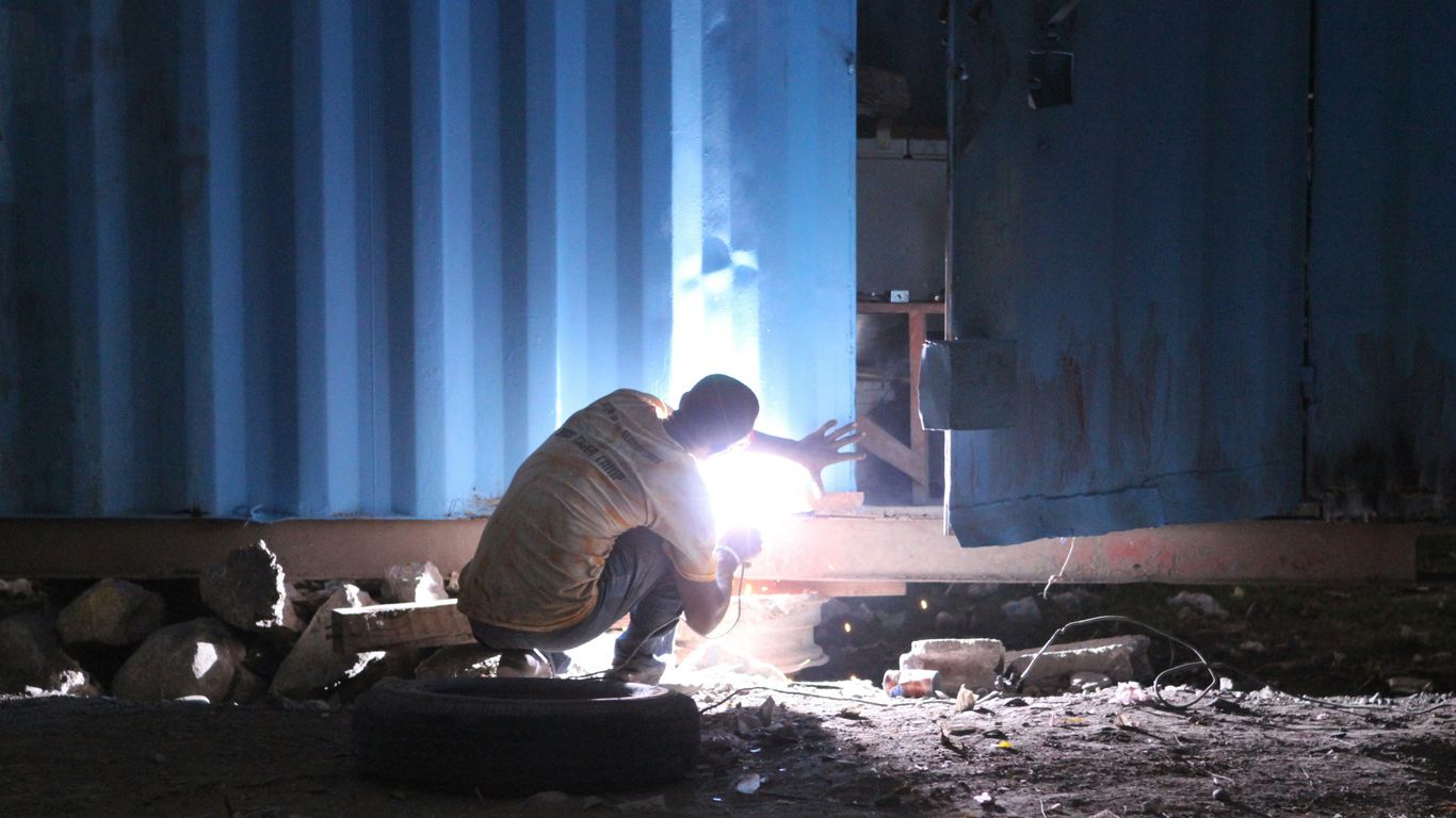 a person working on a machine