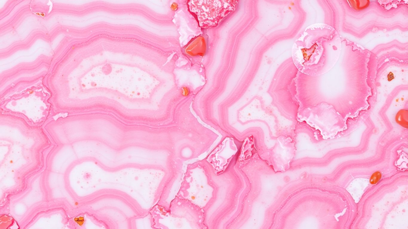 Banded pink and white rhodochrosite crystal formation.