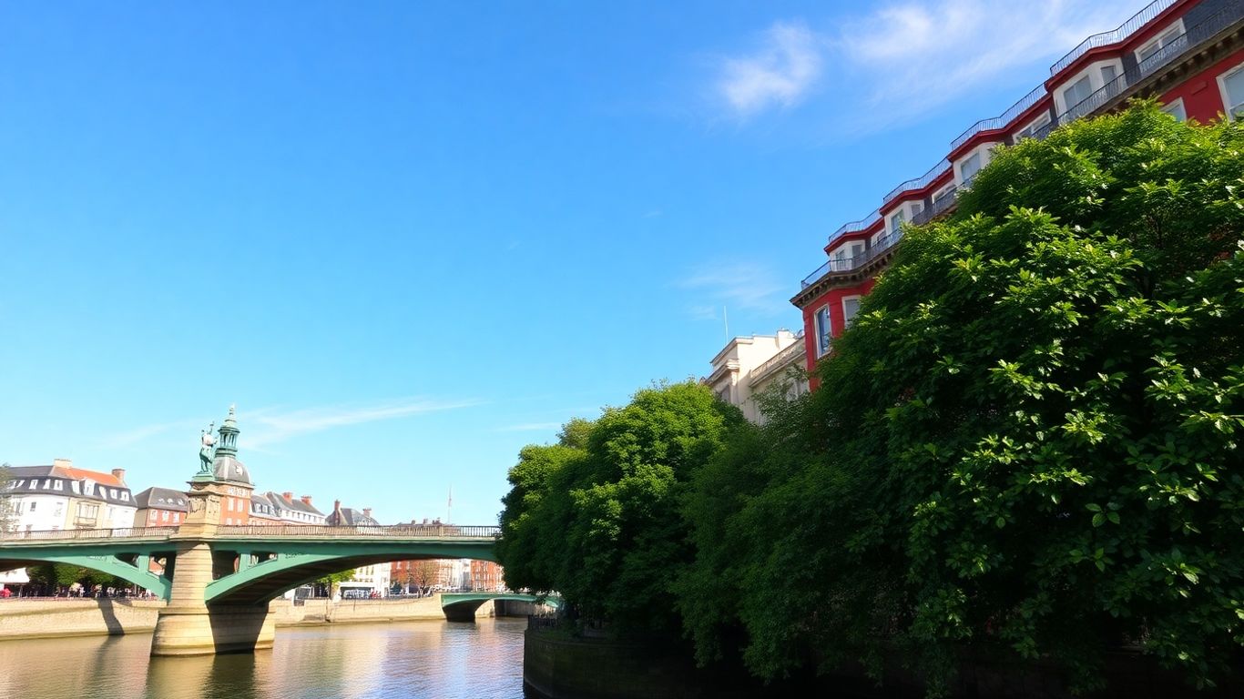 Ha'penny Bridge, Dublin, Ireland, with River Liffey and city buildings.