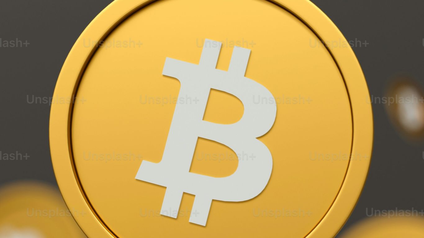 Gold Bitcoin coins floating against a dark background.
