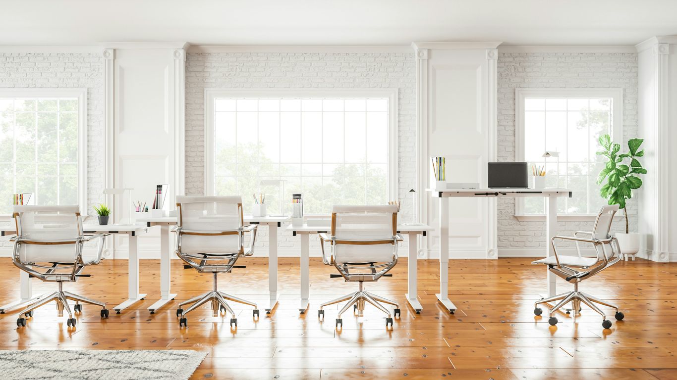a room that has a bunch of chairs in it