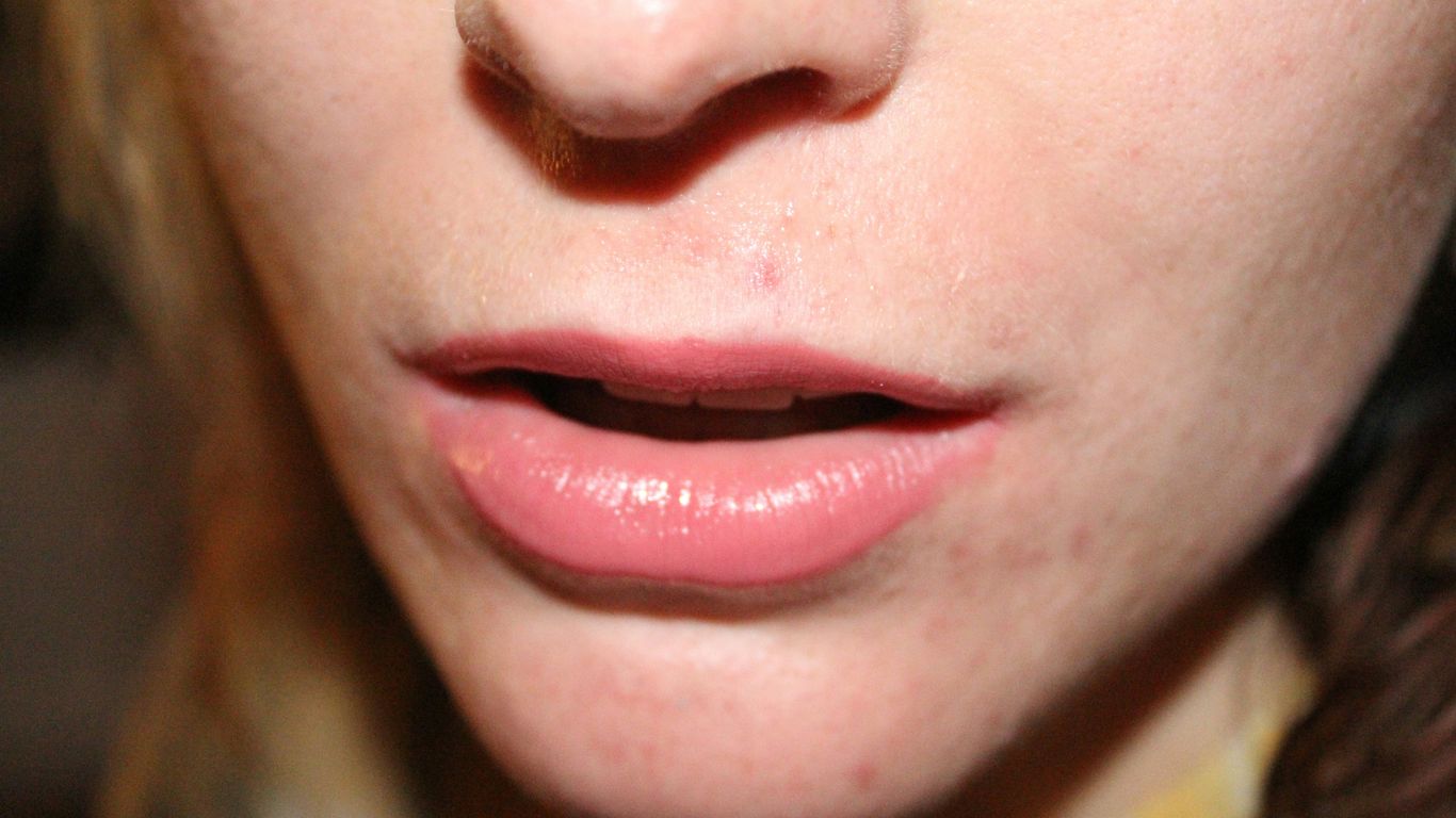 a close up of a woman's face