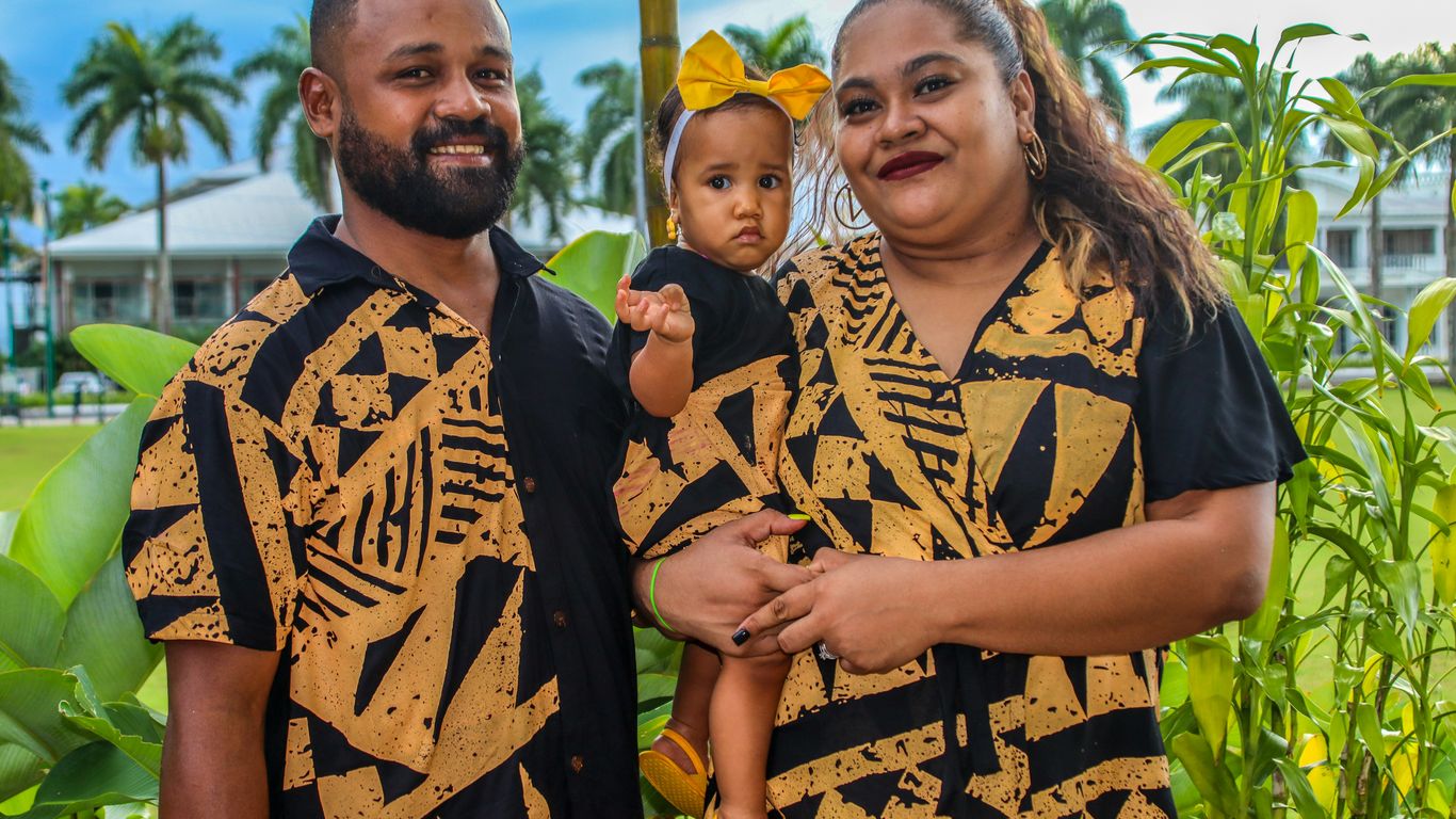 a man and a woman standing next to each other