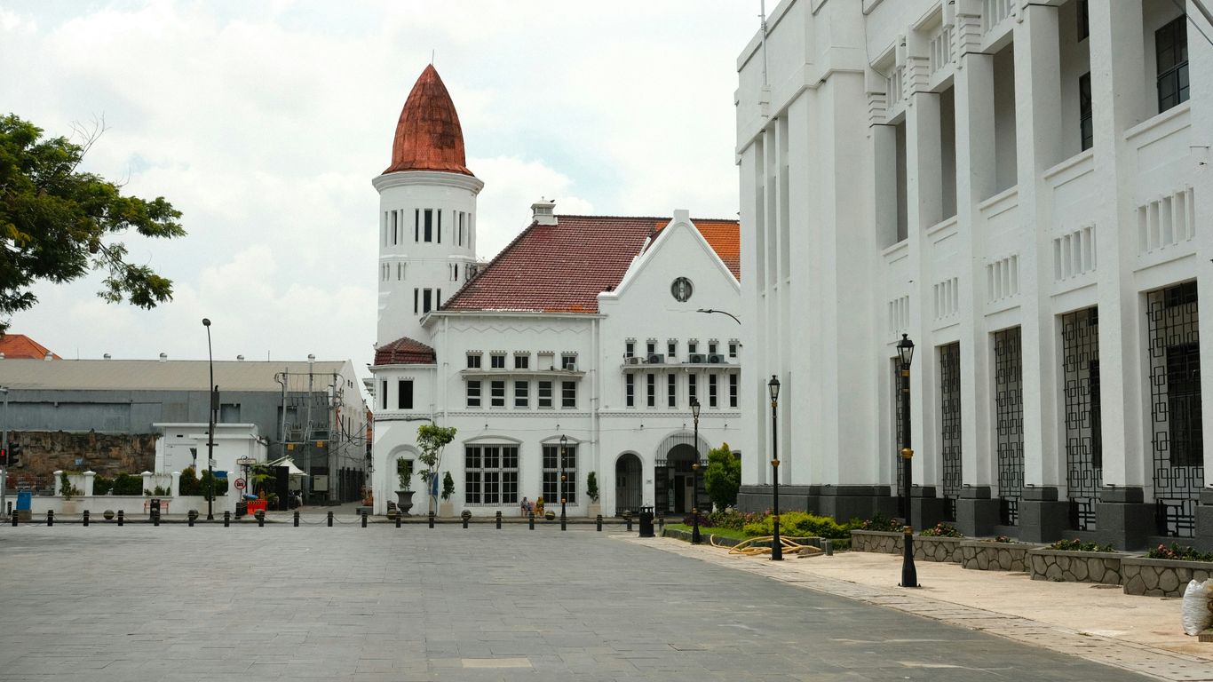 A large white building with a clock tower