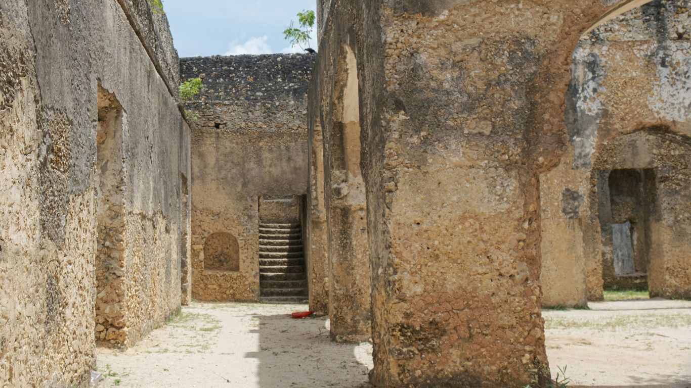a stone building with steps leading up to it