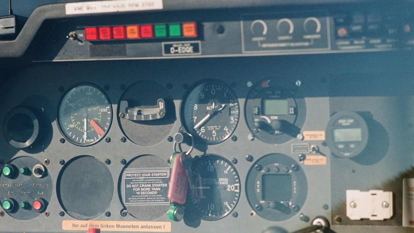 a close up of a control panel on a plane