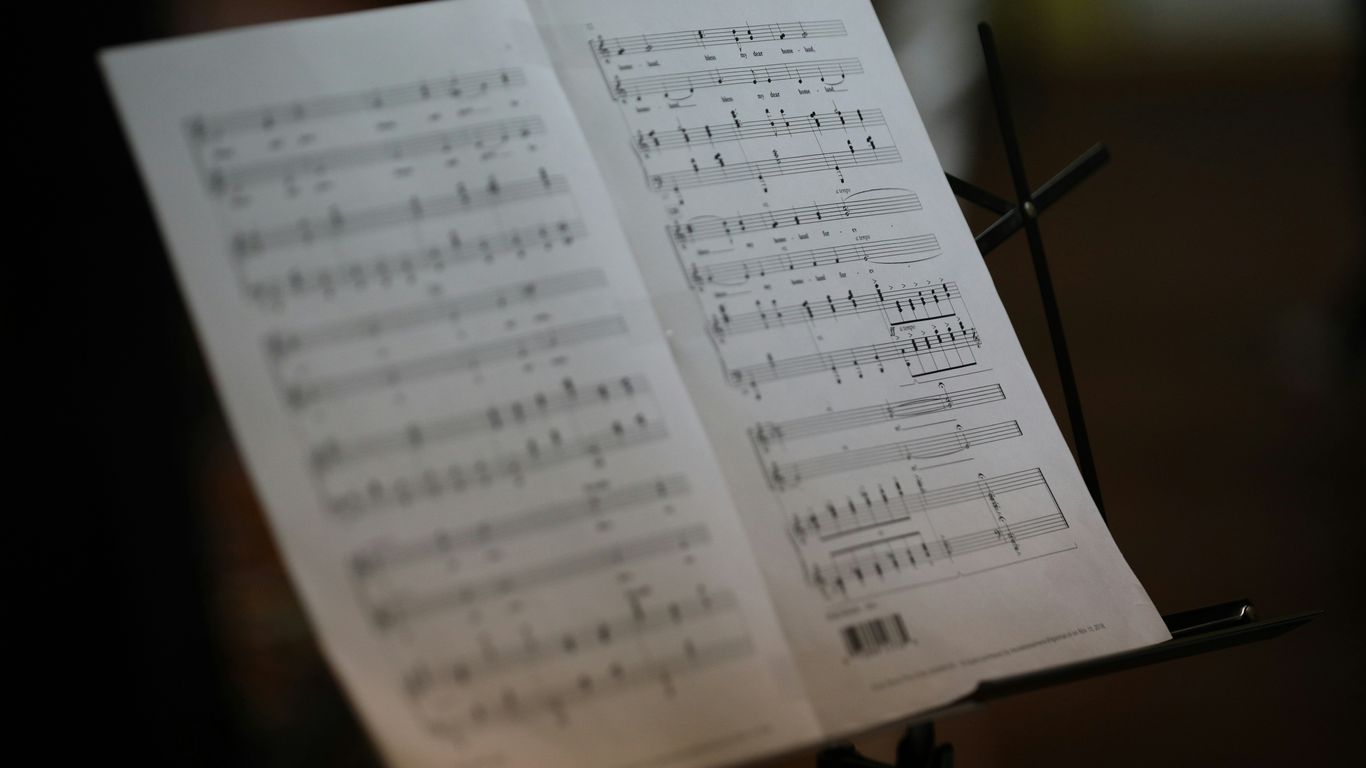 a notebook with a pen and paper