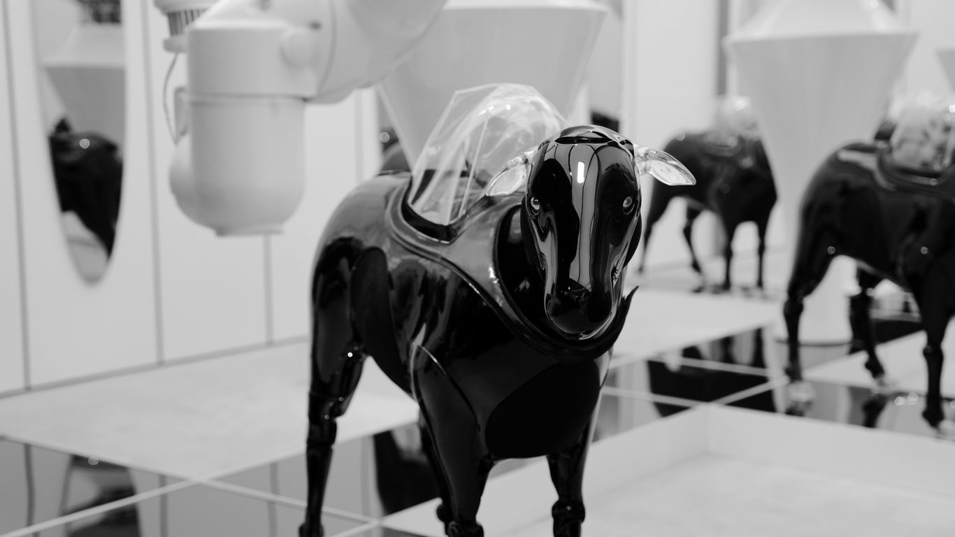 grayscale photo of animal statue