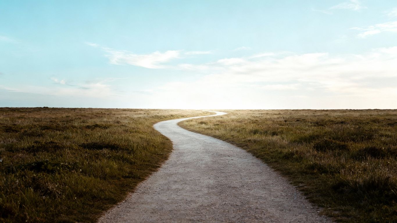 Path leading to a bright horizon