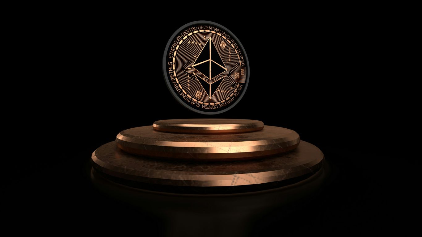 A glowing Ethereum coin displayed on a pedestal against darkness.
