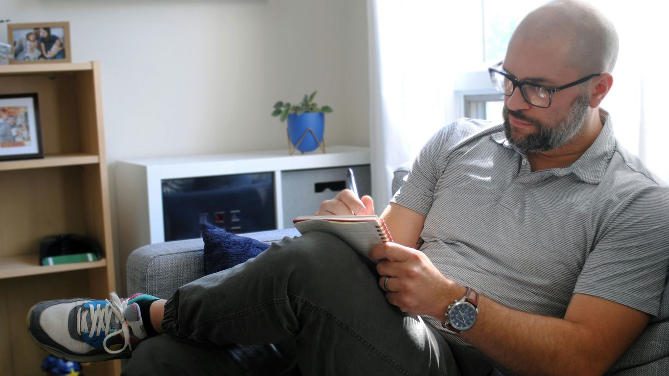 a man sitting on a couch