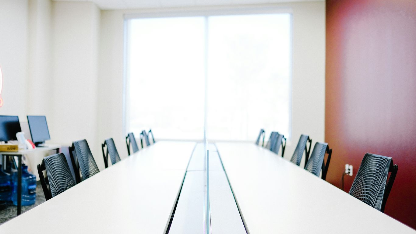 white wooden table with chairs