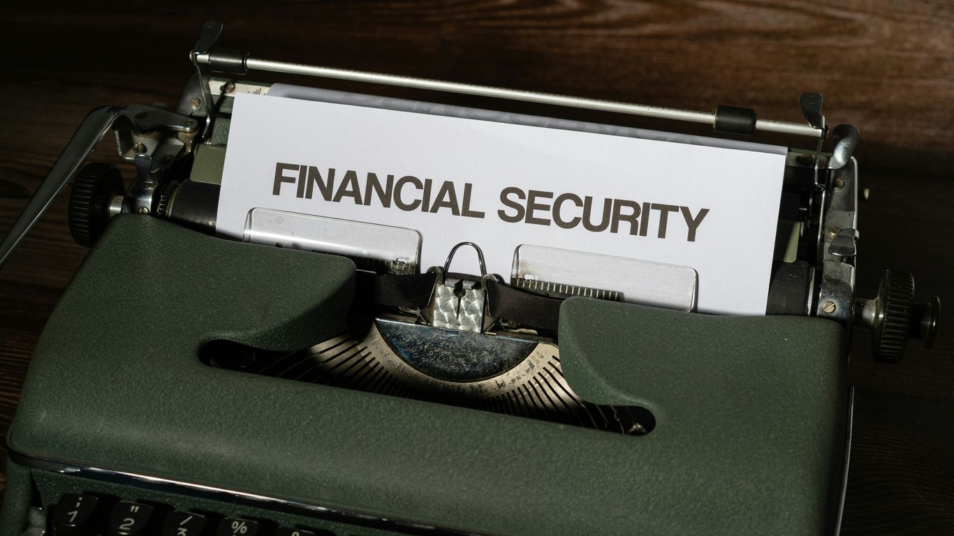 a close up of a typewriter with a sign on it