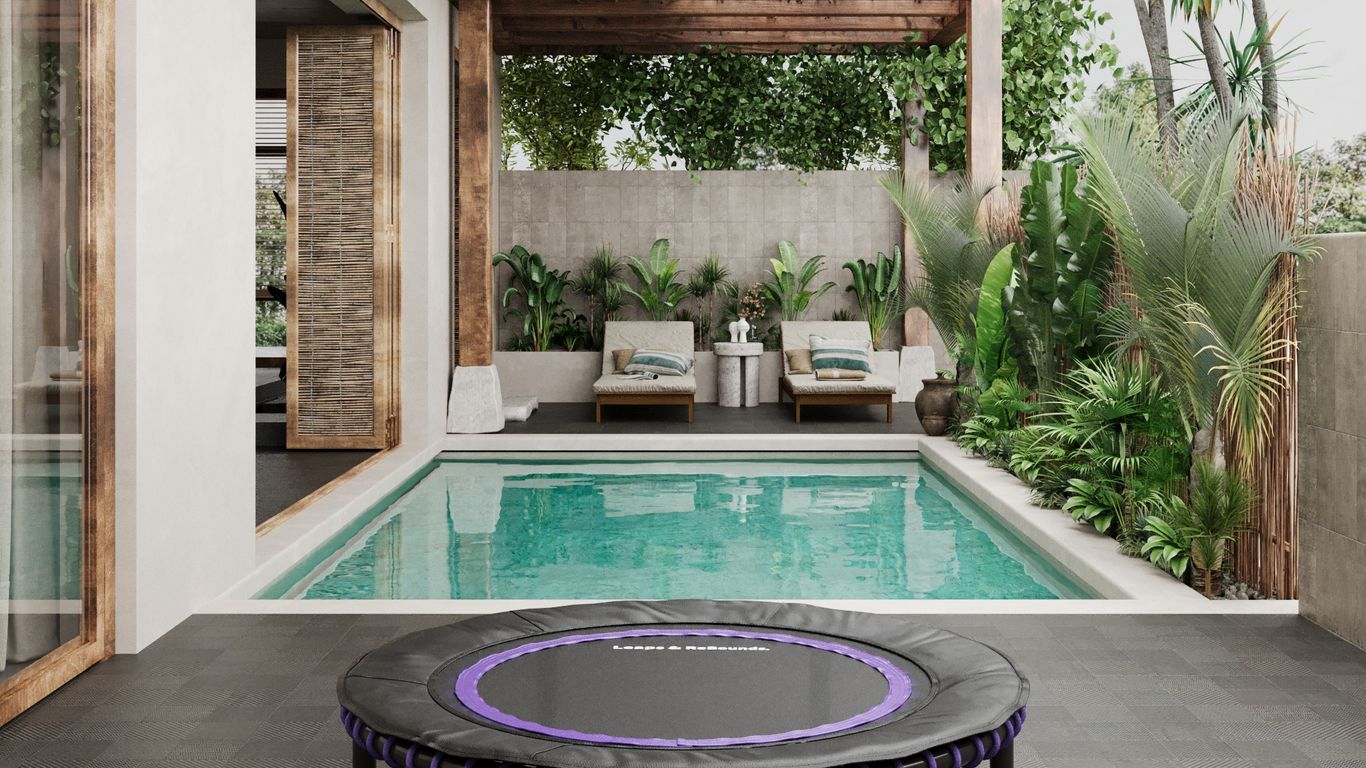 Modern patio with pool, trampoline, lounge chairs, and plants.