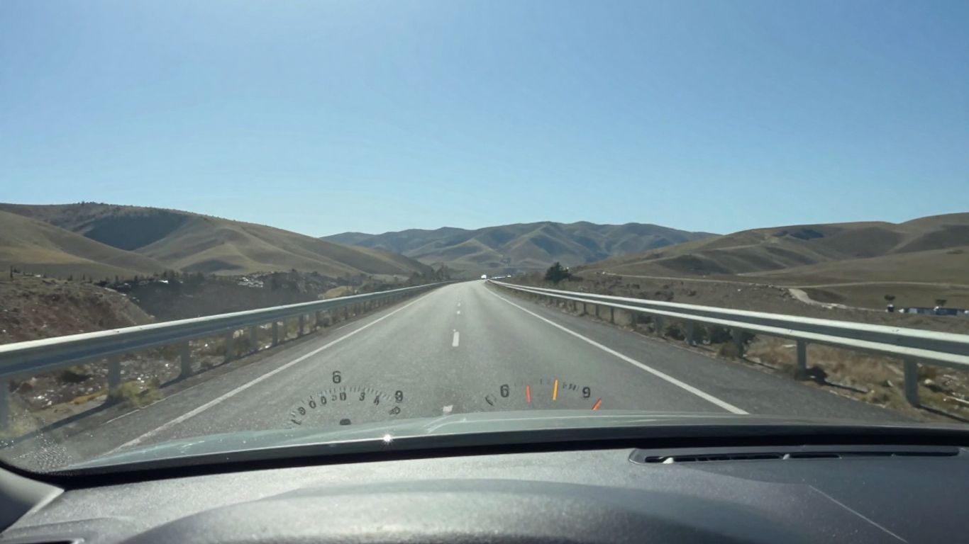 Car driving on a road with low mileage