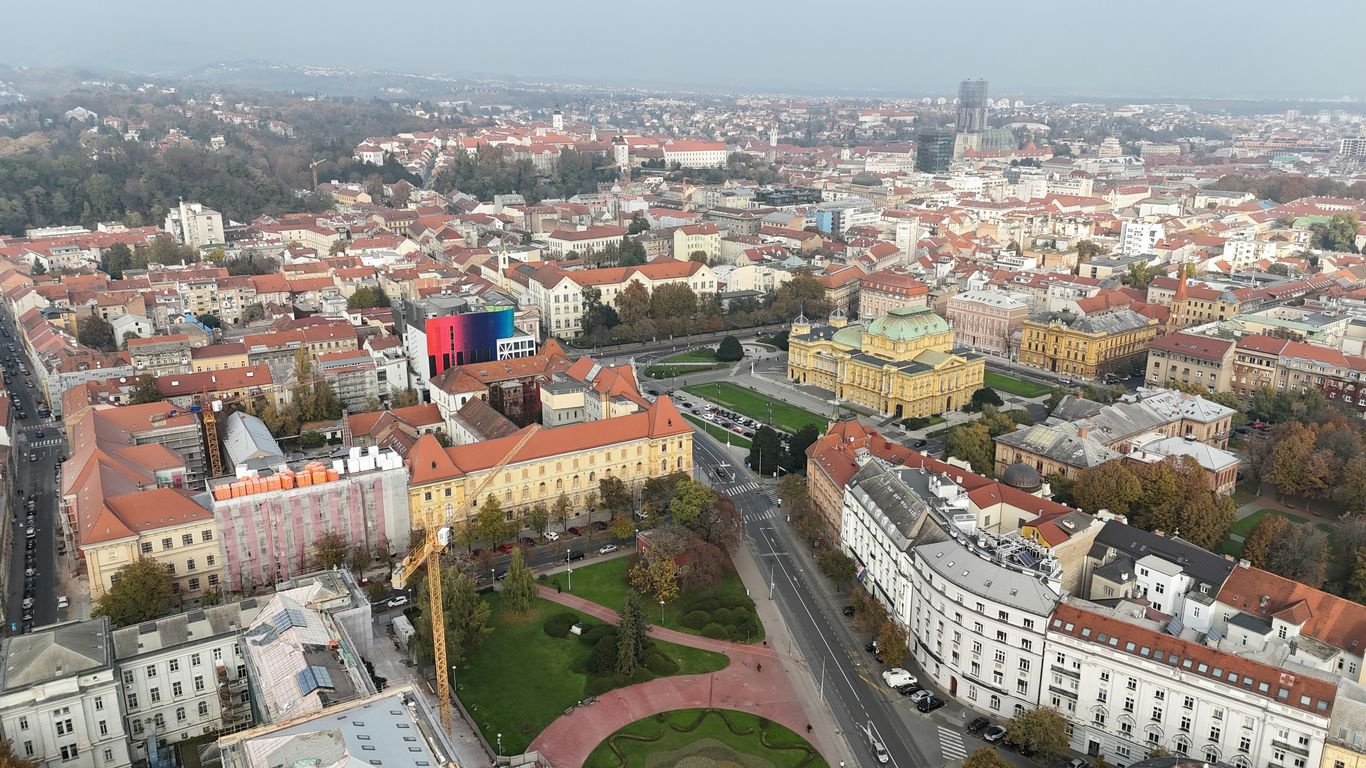 A bird's eye view of a city with lots of buildings