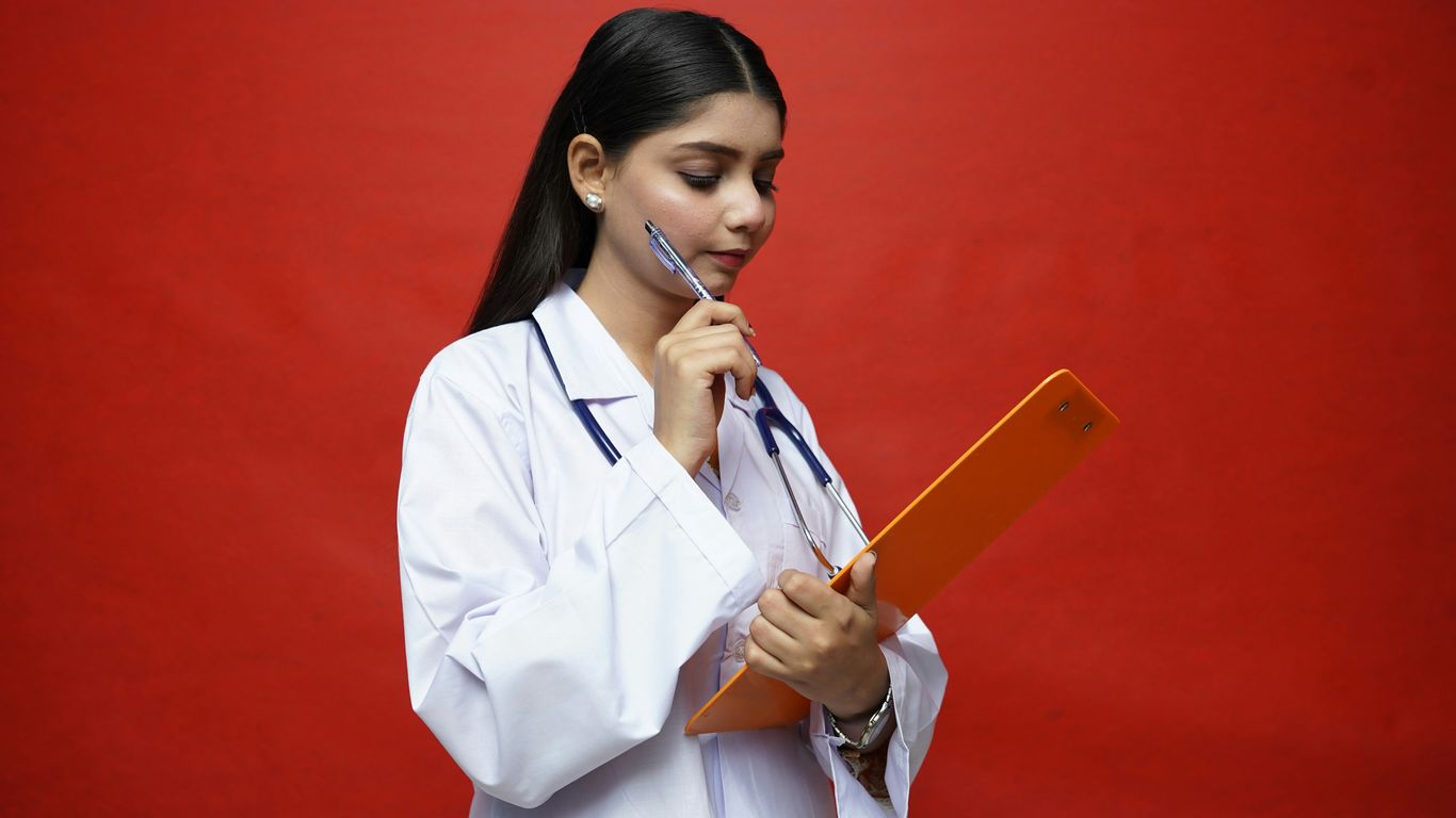 a woman reading Essential Questions and Study Guides