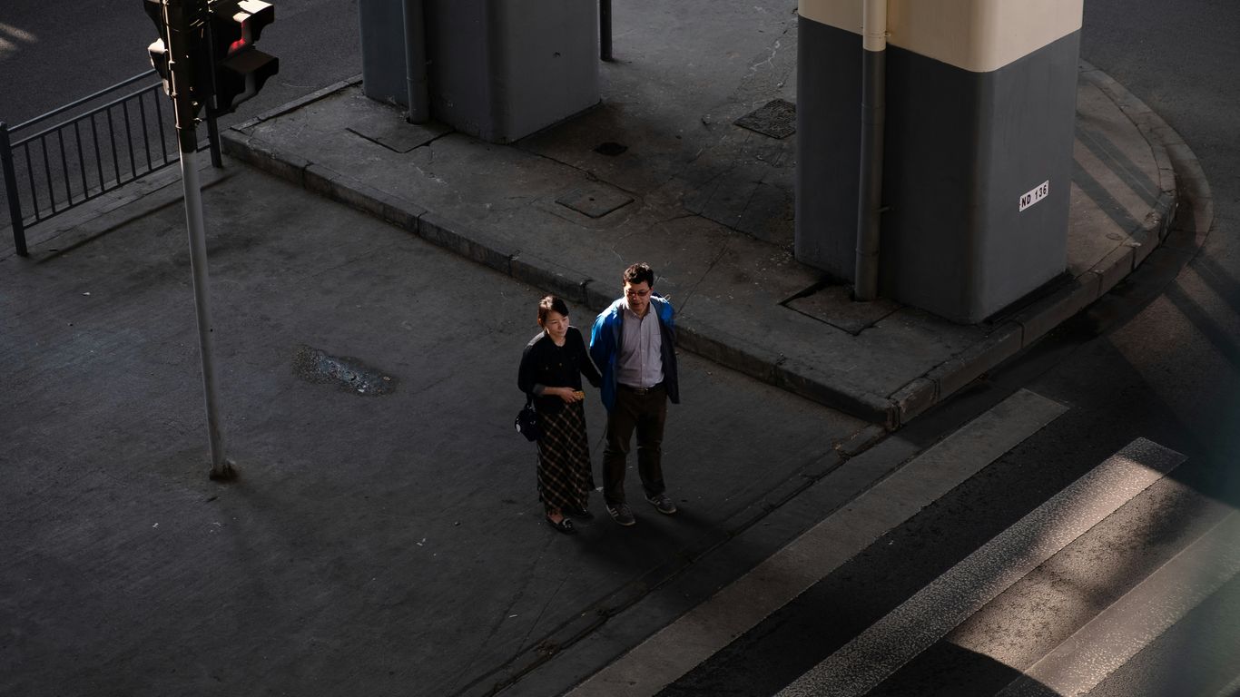 two people on intersection
