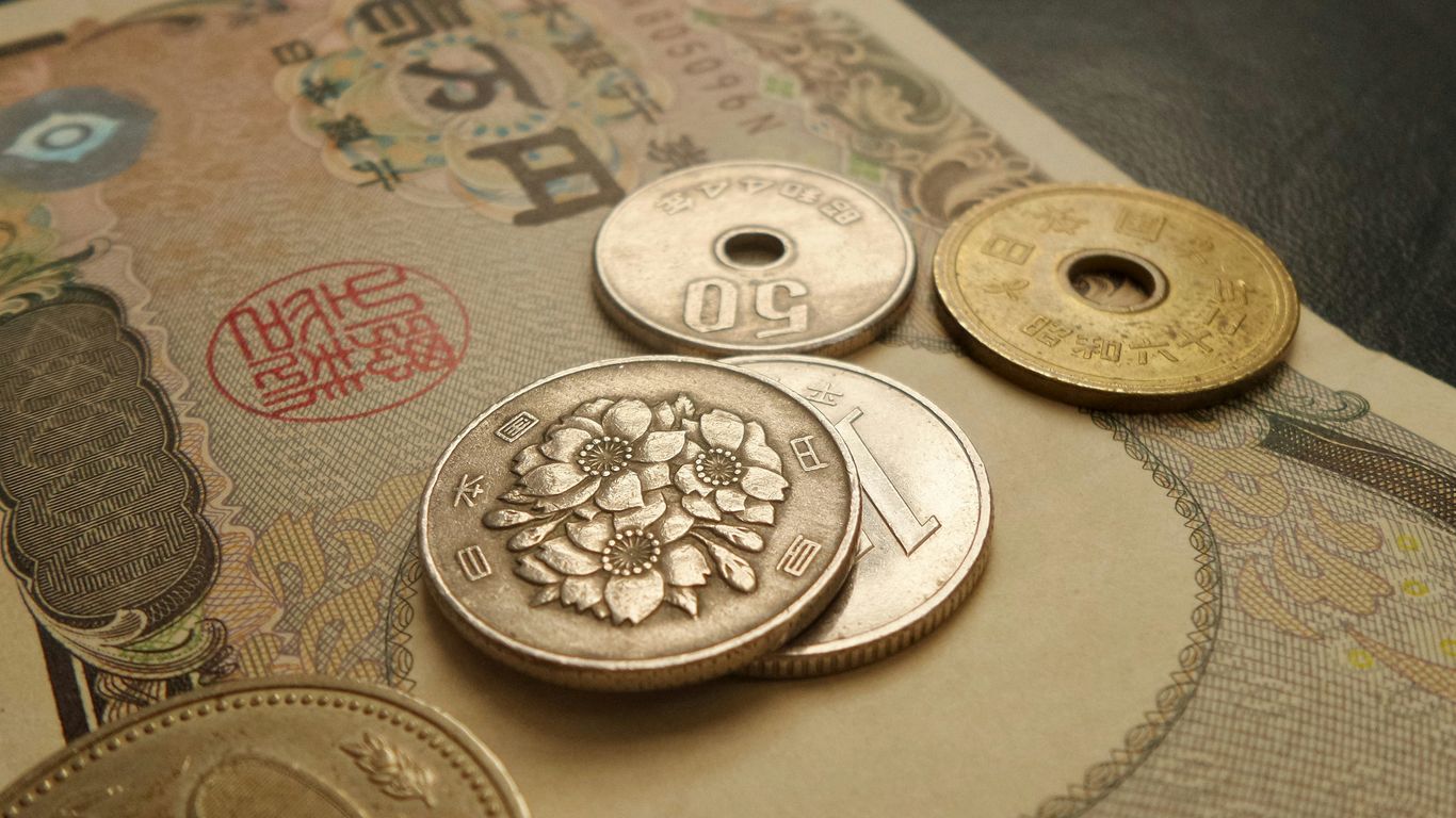 a bunch of coins sitting on top of a table
