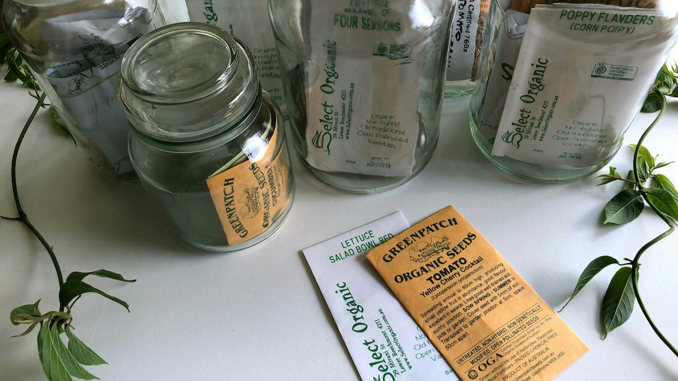 glass mason jars with seed sachet inside