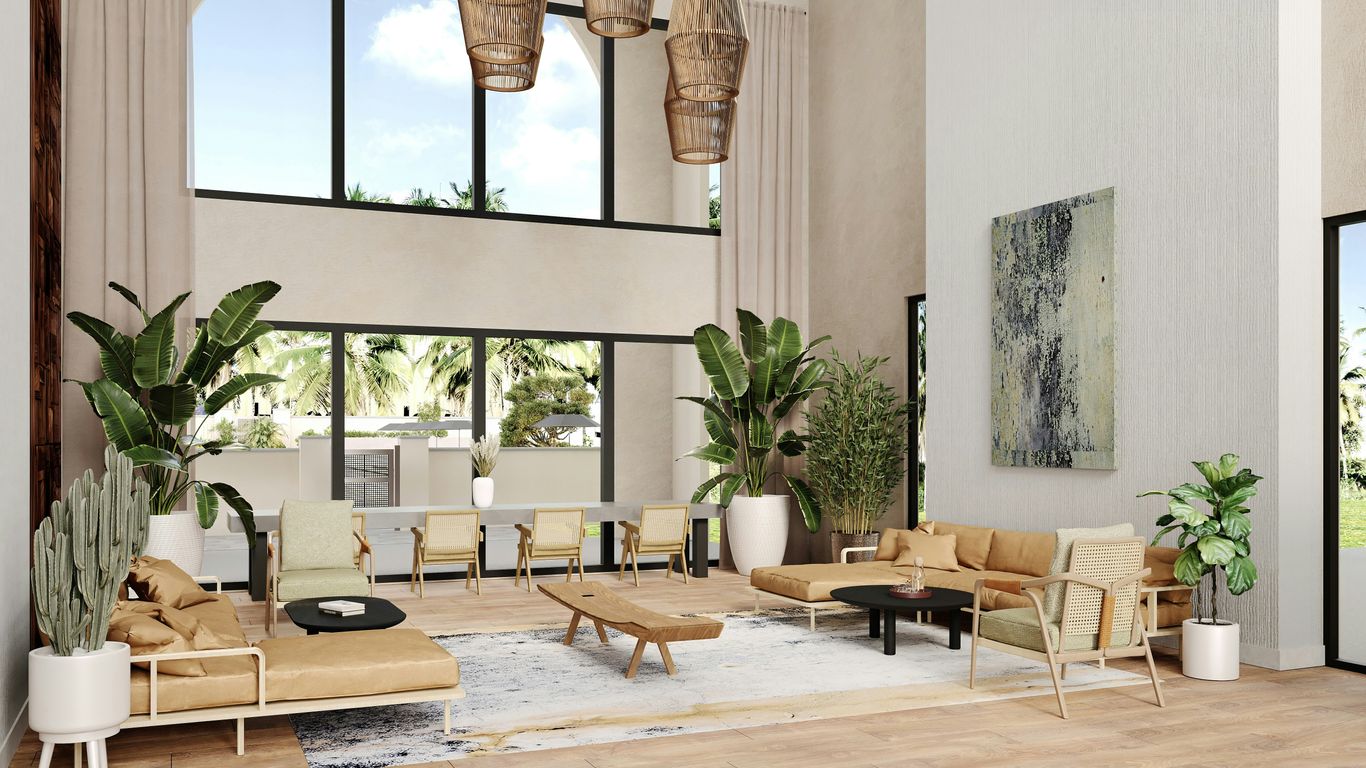 A luxurious living room with high ceilings.