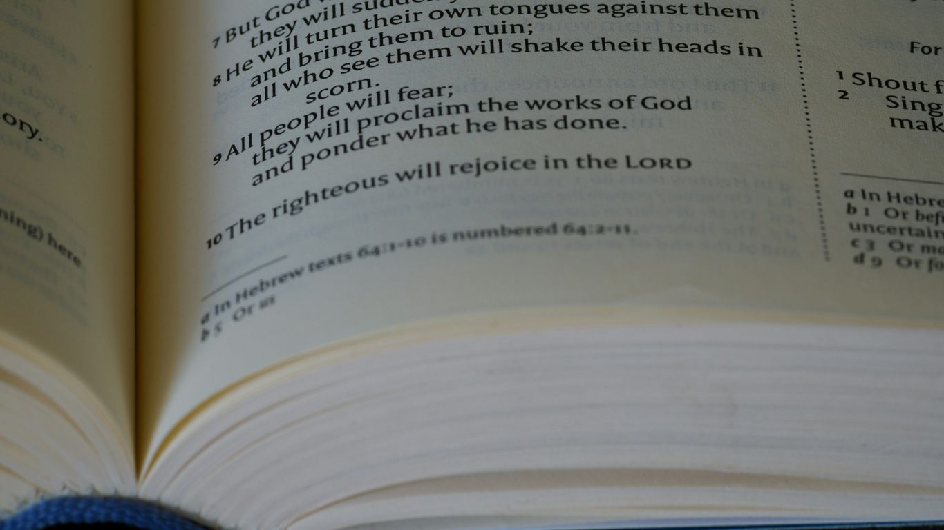 a close up of an open book on a table