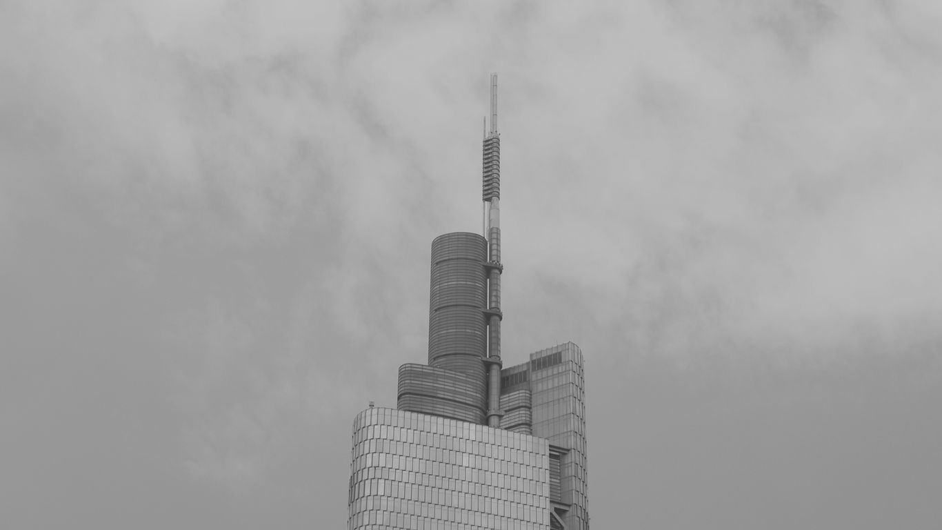 grayscale photo of high rise building