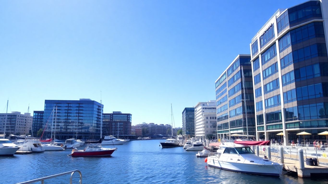 Portsmouth, NH waterfront with modern buildings and boats.