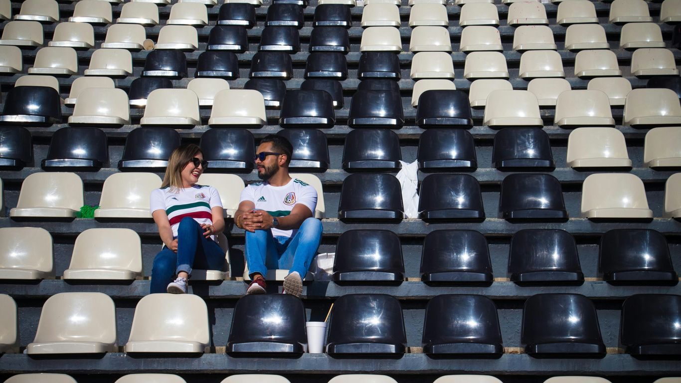people sitting on black chairs