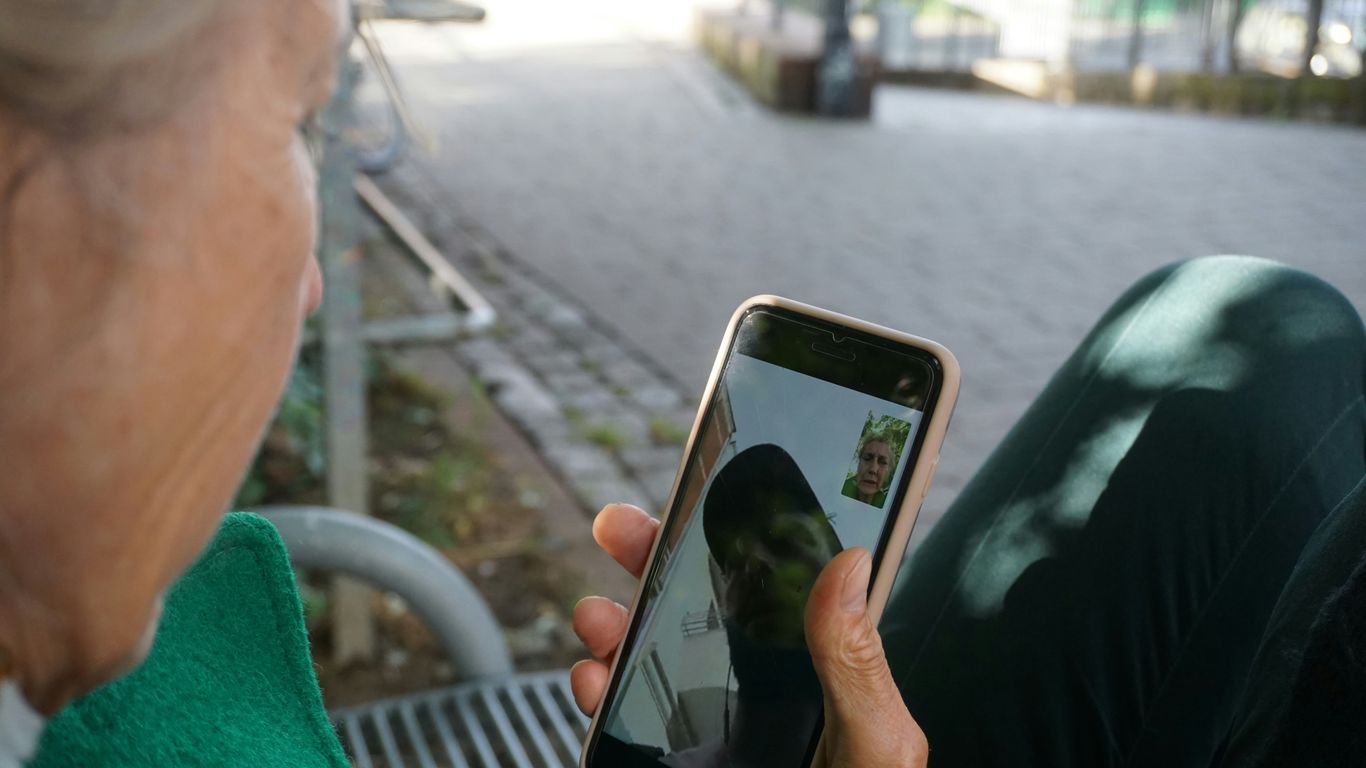 person holding white samsung android smartphone